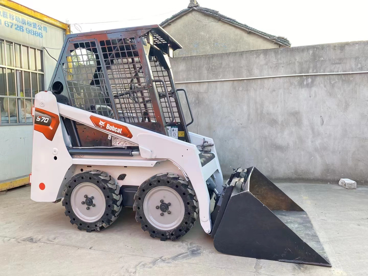 BOBCAT Skid Steer Loader S70 - Mini utovarivač: slika BOBCAT Skid Steer Loader S70 - Mini utovarivač BOBCAT Skid Steer Loader S70 - Mini utovarivač: slika BOBCAT Skid Steer Loader S70 - Mini utovarivač