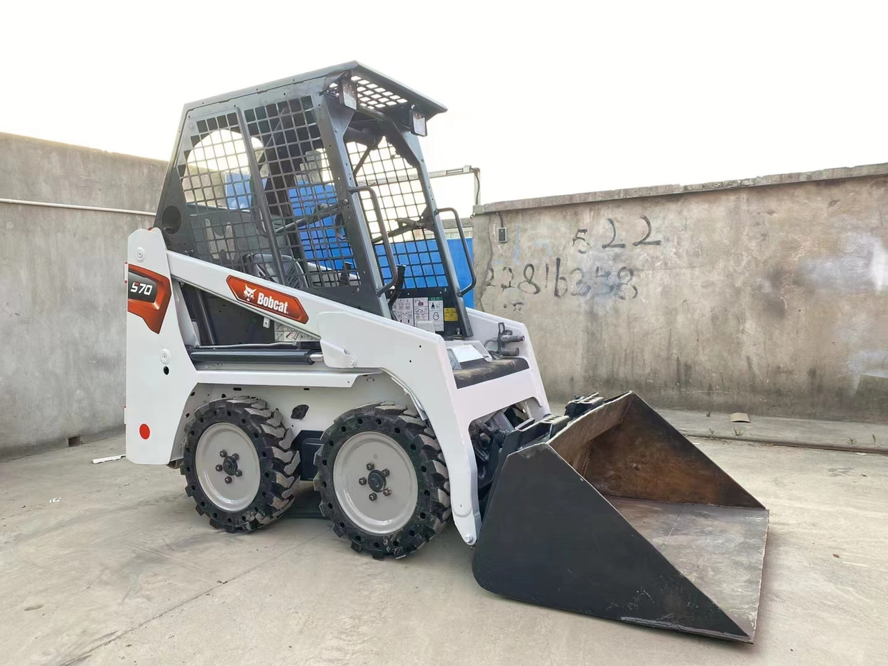 BOBCAT Skid Steer Loader S70 - Mini utovarivač: slika BOBCAT Skid Steer Loader S70 - Mini utovarivač BOBCAT Skid Steer Loader S70 - Mini utovarivač: slika BOBCAT Skid Steer Loader S70 - Mini utovarivač