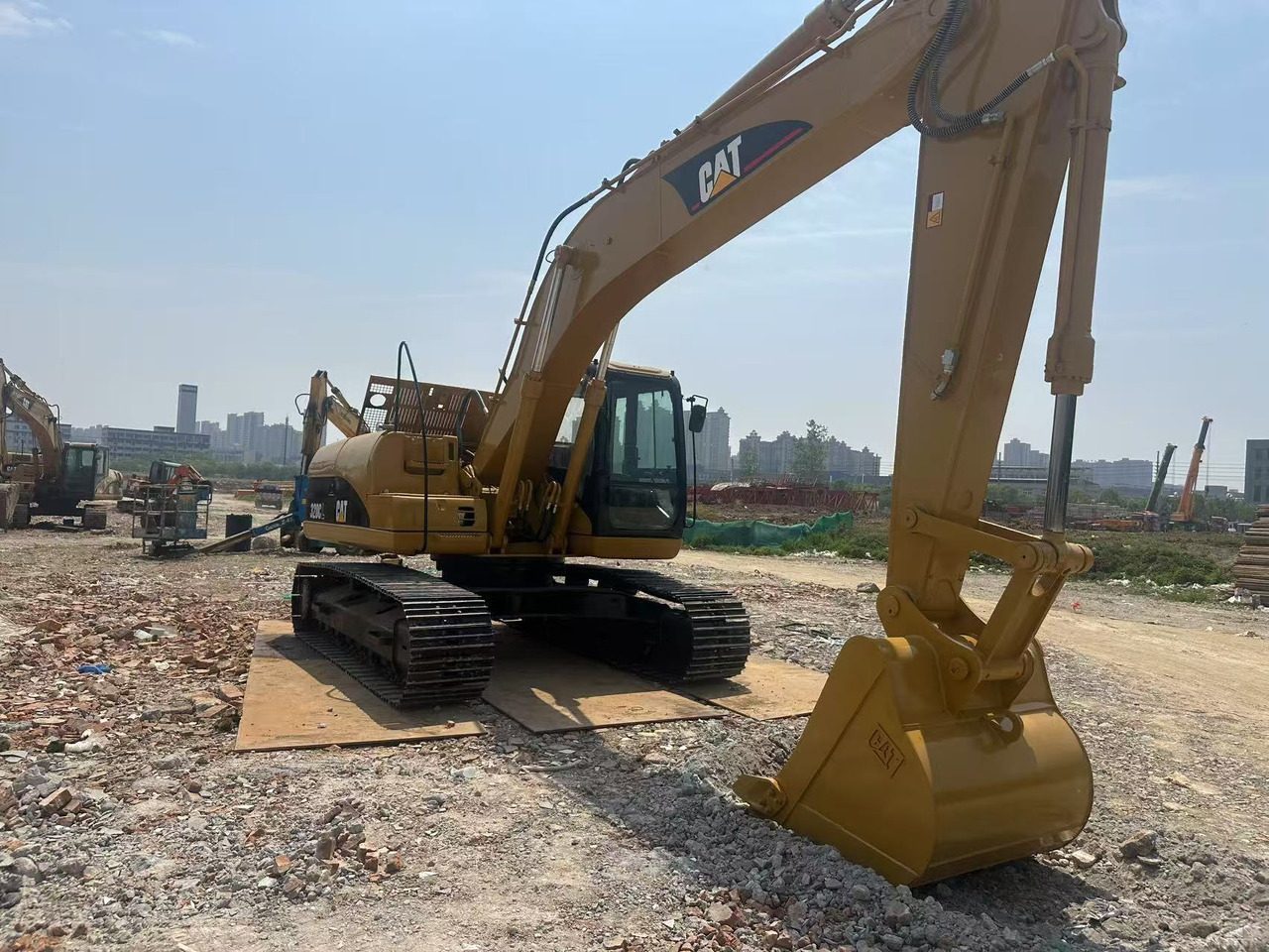CAT 320CL - Bager gusjeničar: slika CAT 320CL - Bager gusjeničar CAT 320CL - Bager gusjeničar: slika CAT 320CL - Bager gusjeničar