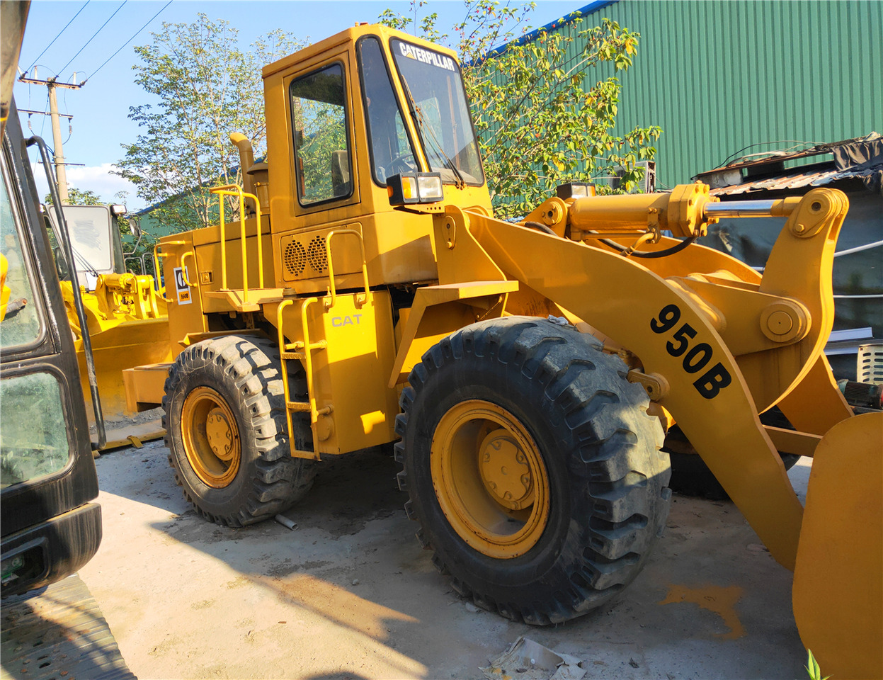CAT Wheel Loader 950B - Utovarivač na kotačima: slika CAT Wheel Loader 950B - Utovarivač na kotačima CAT Wheel Loader 950B - Utovarivač na kotačima: slika CAT Wheel Loader 950B - Utovarivač na kotačima
