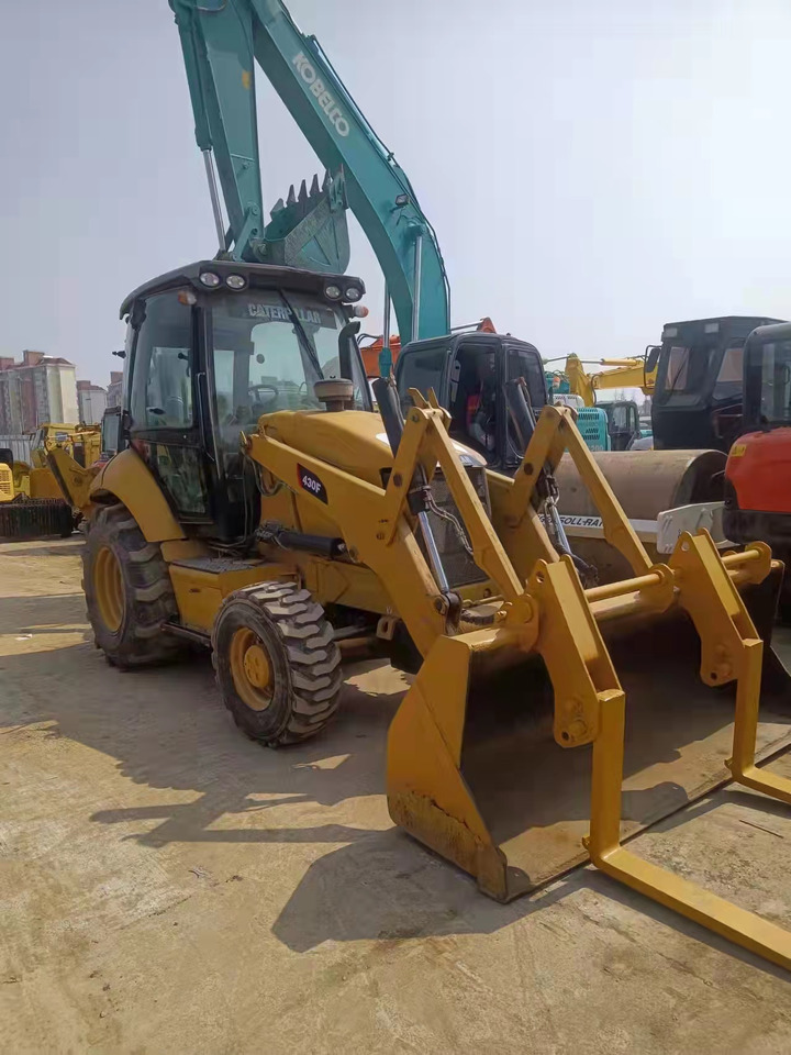 CATERPILLAR 430F - Rovokopač-utovarivač: slika CATERPILLAR 430F - Rovokopač-utovarivač CATERPILLAR 430F - Rovokopač-utovarivač: slika CATERPILLAR 430F - Rovokopač-utovarivač
