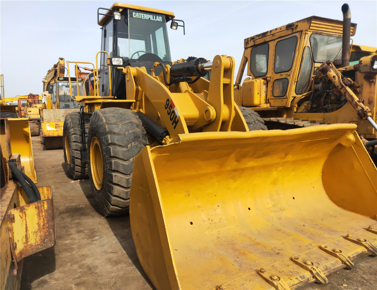 CATERPILLAR Wheel Loader 950H Click Here for Discount - Utovarivač na kotačima: slika CATERPILLAR Wheel Loader 950H Click Here for Discount - Utovarivač na kotačima CATERPILLAR Wheel Loader 950H Click Here for Discount - Utovarivač na kotačima: slika CATERPILLAR Wheel Loader 950H Click Here for Discount - Utovarivač na kotačima