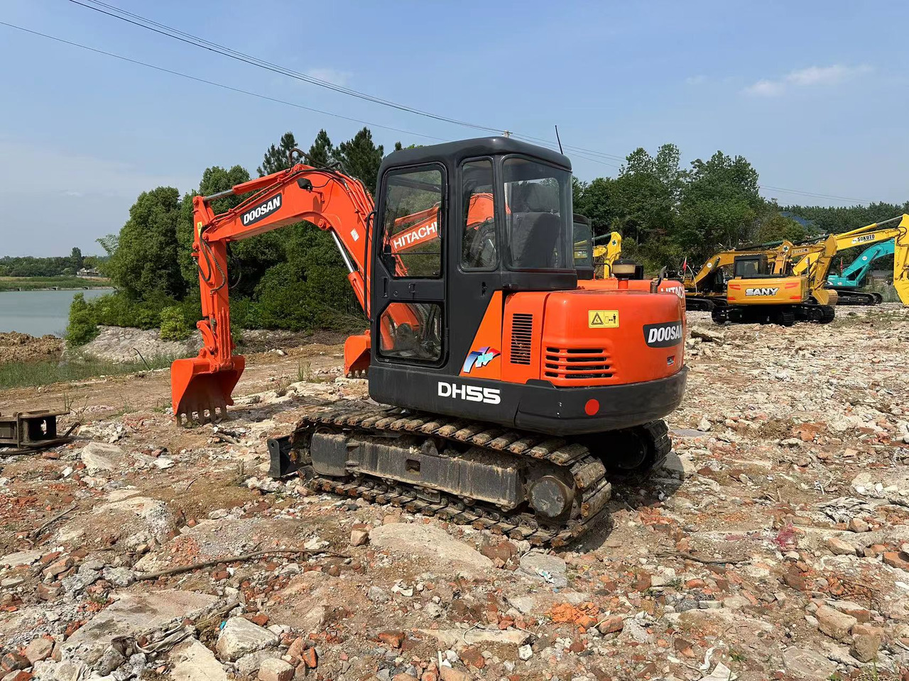 DOOSAN DH55 Mini Excavator 5.5T - Mini bager: slika DOOSAN DH55 Mini Excavator 5.5T - Mini bager DOOSAN DH55 Mini Excavator 5.5T - Mini bager: slika DOOSAN DH55 Mini Excavator 5.5T - Mini bager
