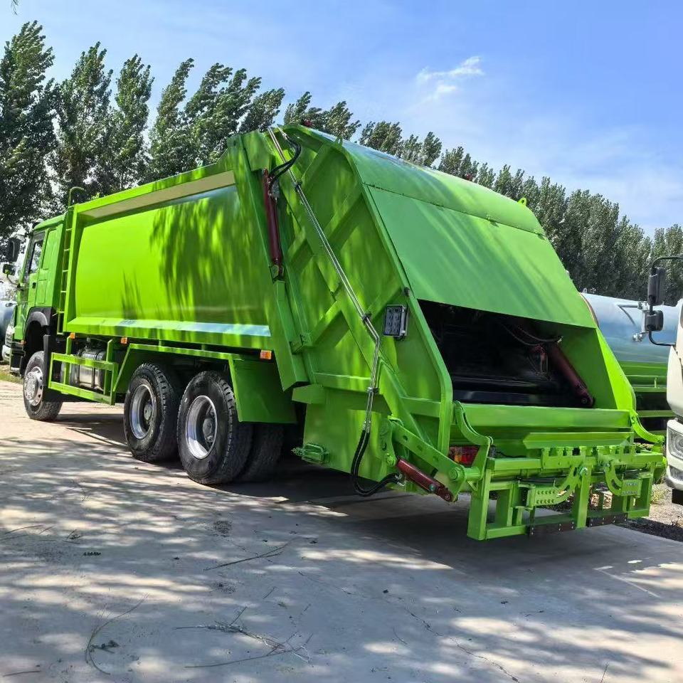 HOWO Garbage Truck Click Here for Discount - Kamion za odvoz smeća: slika HOWO Garbage Truck Click Here for Discount - Kamion za odvoz smeća HOWO Garbage Truck Click Here for Discount - Kamion za odvoz smeća: slika HOWO Garbage Truck Click Here for Discount - Kamion za odvoz smeća