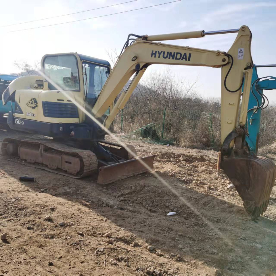HYUNDAI R60-9 - Bager gusjeničar: slika HYUNDAI R60-9 - Bager gusjeničar HYUNDAI R60-9 - Bager gusjeničar: slika HYUNDAI R60-9 - Bager gusjeničar