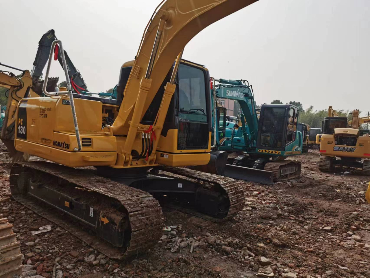KOMATSU PC130-7 - Bager gusjeničar: slika KOMATSU PC130-7 - Bager gusjeničar KOMATSU PC130-7 - Bager gusjeničar: slika KOMATSU PC130-7 - Bager gusjeničar