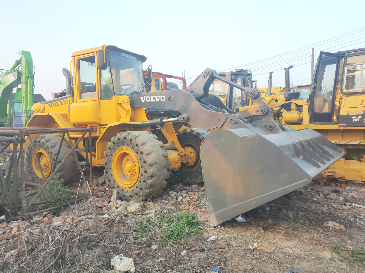 Volvo Wheel Loader Volvo L70E Click Here for Discount - Utovarivač na kotačima: slika Volvo Wheel Loader Volvo L70E Click Here for Discount - Utovarivač na kotačima Volvo Wheel Loader Volvo L70E Click Here for Discount - Utovarivač na kotačima: slika Volvo Wheel Loader Volvo L70E Click Here for Discount - Utovarivač na kotačima