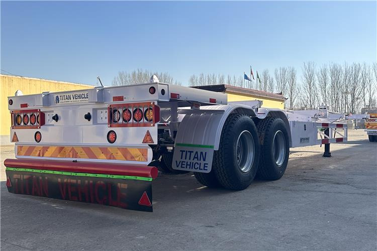 TITAN 2 Axle 40ft Container Transport Trailer for Sale In Nigeria - Poluprikolica-šasija: slika TITAN 2 Axle 40ft Container Transport Trailer for Sale In Nigeria - Poluprikolica-šasija TITAN 2 Axle 40ft Container Transport Trailer for Sale In Nigeria - Poluprikolica-šasija: slika TITAN 2 Axle 40ft Container Transport Trailer for Sale In Nigeria - Poluprikolica-šasija