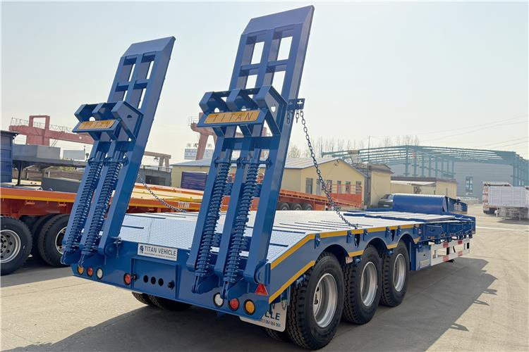 TITAN 3 Axle 80 Ton Low Bed Trailer Price for Sale In Nigeria - Poluprikolica s niskim utovarivačem: slika TITAN 3 Axle 80 Ton Low Bed Trailer Price for Sale In Nigeria - Poluprikolica s niskim utovarivačem TITAN 3 Axle 80 Ton Low Bed Trailer Price for Sale In Nigeria - Poluprikolica s niskim utovarivačem: slika TITAN 3 Axle 80 Ton Low Bed Trailer Price for Sale In Nigeria - Poluprikolica s niskim utovarivačem