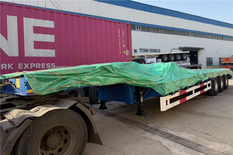 TITAN 3 Axle 80 Ton Low Bed Trailer Price for Sale In Nigeria - Poluprikolica s niskim utovarivačem: slika TITAN 3 Axle 80 Ton Low Bed Trailer Price for Sale In Nigeria - Poluprikolica s niskim utovarivačem TITAN 3 Axle 80 Ton Low Bed Trailer Price for Sale In Nigeria - Poluprikolica s niskim utovarivačem: slika TITAN 3 Axle 80 Ton Low Bed Trailer Price for Sale In Nigeria - Poluprikolica s niskim utovarivačem
