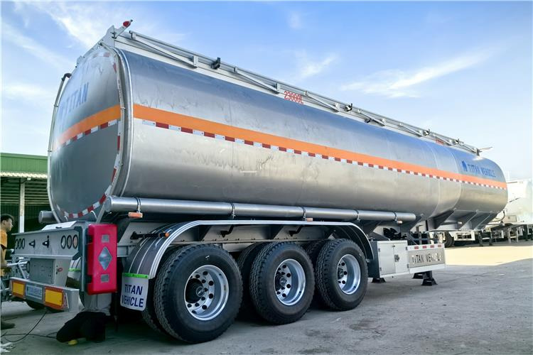 TITAN 3 Axle Aluminum Fuel Tanker Trailer for Sale In Jamaica - Poluprikolica cisterna: slika TITAN 3 Axle Aluminum Fuel Tanker Trailer for Sale In Jamaica - Poluprikolica cisterna TITAN 3 Axle Aluminum Fuel Tanker Trailer for Sale In Jamaica - Poluprikolica cisterna: slika TITAN 3 Axle Aluminum Fuel Tanker Trailer for Sale In Jamaica - Poluprikolica cisterna