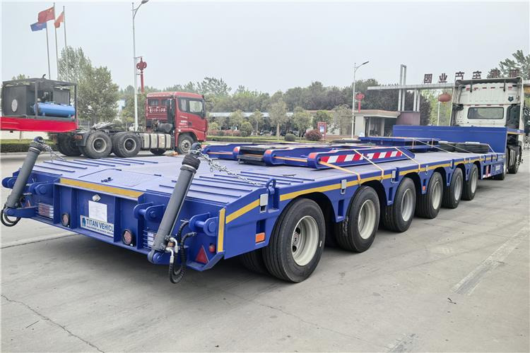TITAN 6 Axle 120 Ton Extendable Low Loader Trailer for Sale Price - Poluprikolica s niskim utovarivačem: slika TITAN 6 Axle 120 Ton Extendable Low Loader Trailer for Sale Price - Poluprikolica s niskim utovarivačem TITAN 6 Axle 120 Ton Extendable Low Loader Trailer for Sale Price - Poluprikolica s niskim utovarivačem: slika TITAN 6 Axle 120 Ton Extendable Low Loader Trailer for Sale Price - Poluprikolica s niskim utovarivačem