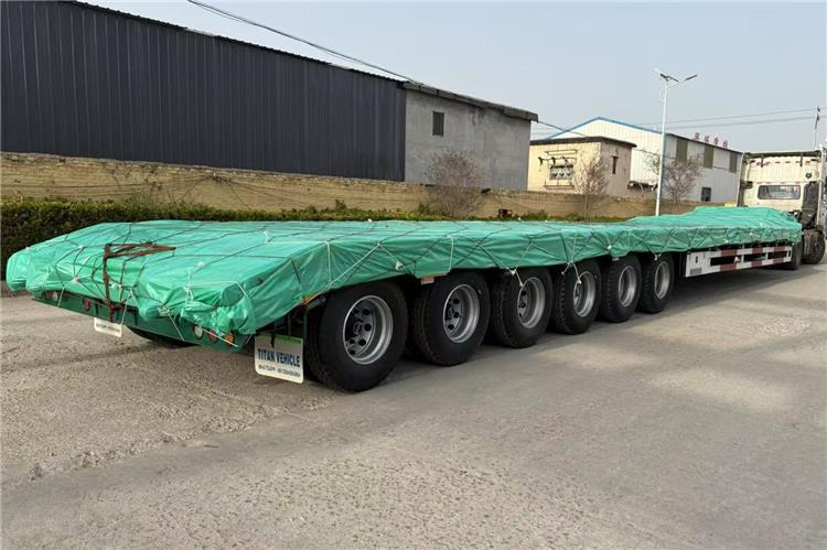 TITAN 6 Axle 80 Ton Low Loader Semi Trailer for Sale In Zambia - Poluprikolica s niskim utovarivačem: slika TITAN 6 Axle 80 Ton Low Loader Semi Trailer for Sale In Zambia - Poluprikolica s niskim utovarivačem TITAN 6 Axle 80 Ton Low Loader Semi Trailer for Sale In Zambia - Poluprikolica s niskim utovarivačem: slika TITAN 6 Axle 80 Ton Low Loader Semi Trailer for Sale In Zambia - Poluprikolica s niskim utovarivačem