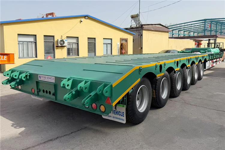 TITAN 6 Axle 80 Ton Low Loader Semi Trailer for Sale In Zambia - Poluprikolica s niskim utovarivačem: slika TITAN 6 Axle 80 Ton Low Loader Semi Trailer for Sale In Zambia - Poluprikolica s niskim utovarivačem TITAN 6 Axle 80 Ton Low Loader Semi Trailer for Sale In Zambia - Poluprikolica s niskim utovarivačem: slika TITAN 6 Axle 80 Ton Low Loader Semi Trailer for Sale In Zambia - Poluprikolica s niskim utovarivačem