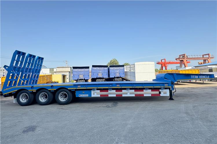 TITAN Tri Axle 80 Ton Low Loader Semi Trailer for Sale In Benin - Poluprikolica s niskim utovarivačem: slika TITAN Tri Axle 80 Ton Low Loader Semi Trailer for Sale In Benin - Poluprikolica s niskim utovarivačem TITAN Tri Axle 80 Ton Low Loader Semi Trailer for Sale In Benin - Poluprikolica s niskim utovarivačem: slika TITAN Tri Axle 80 Ton Low Loader Semi Trailer for Sale In Benin - Poluprikolica s niskim utovarivačem