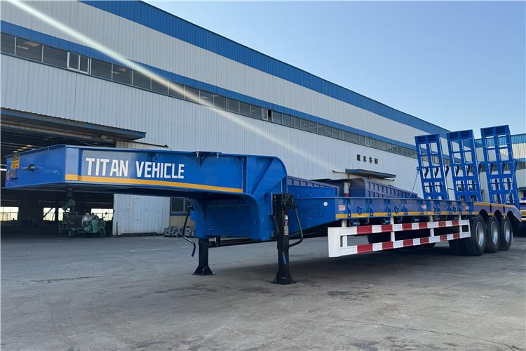 TITAN Tri Axle 80 Ton Low Loader Semi Trailer for Sale In Benin - Poluprikolica s niskim utovarivačem: slika TITAN Tri Axle 80 Ton Low Loader Semi Trailer for Sale In Benin - Poluprikolica s niskim utovarivačem TITAN Tri Axle 80 Ton Low Loader Semi Trailer for Sale In Benin - Poluprikolica s niskim utovarivačem: slika TITAN Tri Axle 80 Ton Low Loader Semi Trailer for Sale In Benin - Poluprikolica s niskim utovarivačem