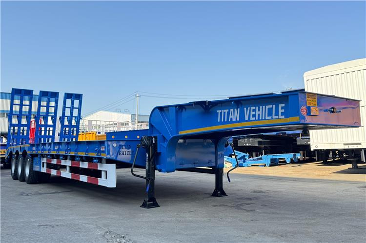 TITAN Tri Axle 80 Ton Low Loader Semi Trailer for Sale In Benin - Poluprikolica s niskim utovarivačem: slika TITAN Tri Axle 80 Ton Low Loader Semi Trailer for Sale In Benin - Poluprikolica s niskim utovarivačem TITAN Tri Axle 80 Ton Low Loader Semi Trailer for Sale In Benin - Poluprikolica s niskim utovarivačem: slika TITAN Tri Axle 80 Ton Low Loader Semi Trailer for Sale In Benin - Poluprikolica s niskim utovarivačem