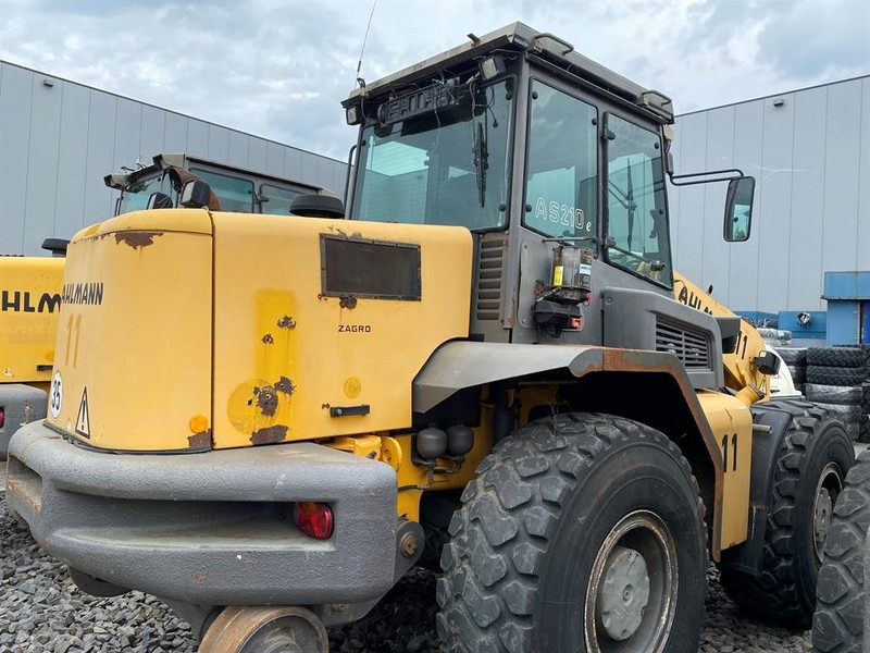 Ahlmann AZ210E - (For parts) - Utovarivač na kotačima: slika Ahlmann AZ210E - (For parts) - Utovarivač na kotačima Ahlmann AZ210E - (For parts) - Utovarivač na kotačima: slika Ahlmann AZ210E - (For parts) - Utovarivač na kotačima