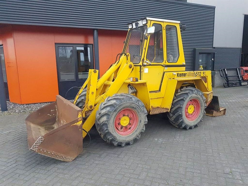 Kramer 512 - (For parts) - Utovarivač na kotačima: slika Kramer 512 - (For parts) - Utovarivač na kotačima Kramer 512 - (For parts) - Utovarivač na kotačima: slika Kramer 512 - (For parts) - Utovarivač na kotačima