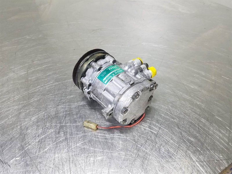 Liebherr L507-Sanden SD7B10-7170-Compressor/Kompressor - A/C kompresor za Građevinski strojevi: slika Liebherr L507-Sanden SD7B10-7170-Compressor/Kompressor - A/C kompresor za Građevinski strojevi Liebherr L507-Sanden SD7B10-7170-Compressor/Kompressor - A/C kompresor za Građevinski strojevi: slika Liebherr L507-Sanden SD7B10-7170-Compressor/Kompressor - A/C kompresor za Građevinski strojevi