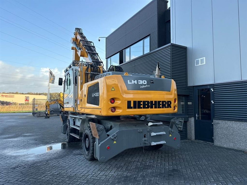 Liebherr LH 30 M - Stroj za rukovanje otpadom: slika Liebherr LH 30 M - Stroj za rukovanje otpadom Liebherr LH 30 M - Stroj za rukovanje otpadom: slika Liebherr LH 30 M - Stroj za rukovanje otpadom