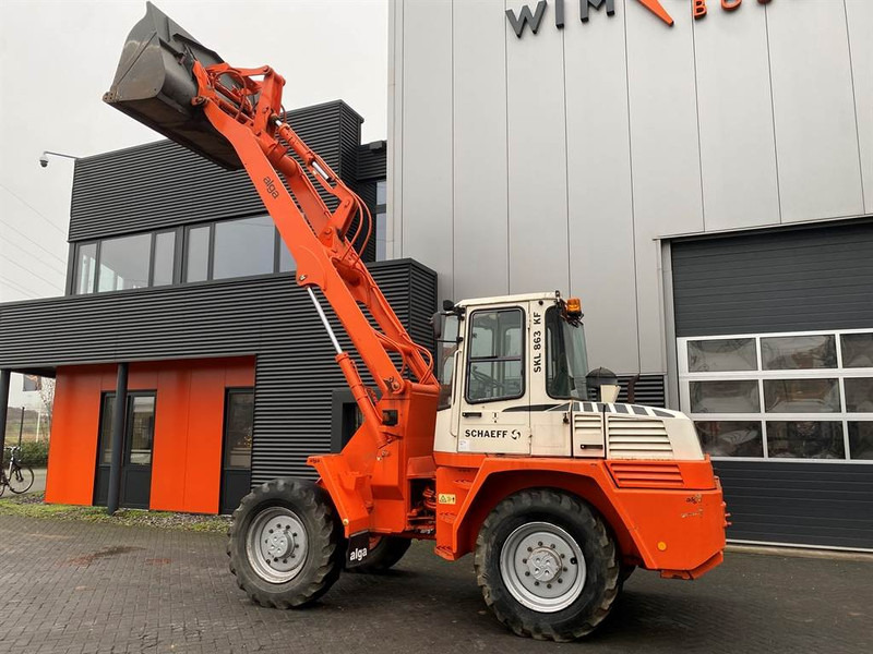 Schaeff SKL863 High-Lift Special - Utovarivač na kotačima: slika Schaeff SKL863 High-Lift Special - Utovarivač na kotačima Schaeff SKL863 High-Lift Special - Utovarivač na kotačima: slika Schaeff SKL863 High-Lift Special - Utovarivač na kotačima