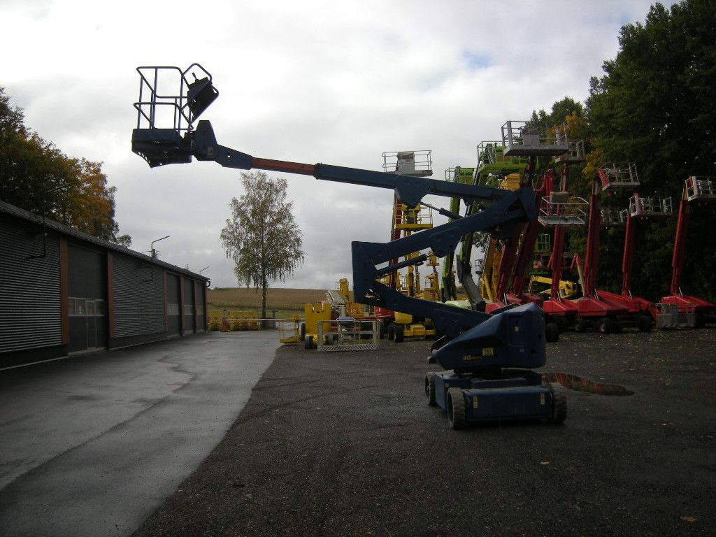 JLG N40E Gelenkteleskoparbeitsbühne 14 m - Podizna platforma montirana na kamion: slika JLG N40E Gelenkteleskoparbeitsbühne 14 m - Podizna platforma montirana na kamion JLG N40E Gelenkteleskoparbeitsbühne 14 m - Podizna platforma montirana na kamion: slika JLG N40E Gelenkteleskoparbeitsbühne 14 m - Podizna platforma montirana na kamion
