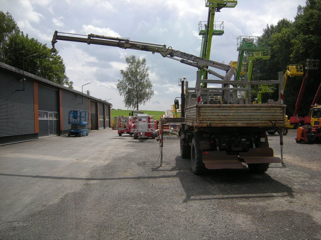 Mercedes-Benz Unimog U1250 mit Kran MKG 105 - Mali kamion kiper: slika Mercedes-Benz Unimog U1250 mit Kran MKG 105 - Mali kamion kiper Mercedes-Benz Unimog U1250 mit Kran MKG 105 - Mali kamion kiper: slika Mercedes-Benz Unimog U1250 mit Kran MKG 105 - Mali kamion kiper
