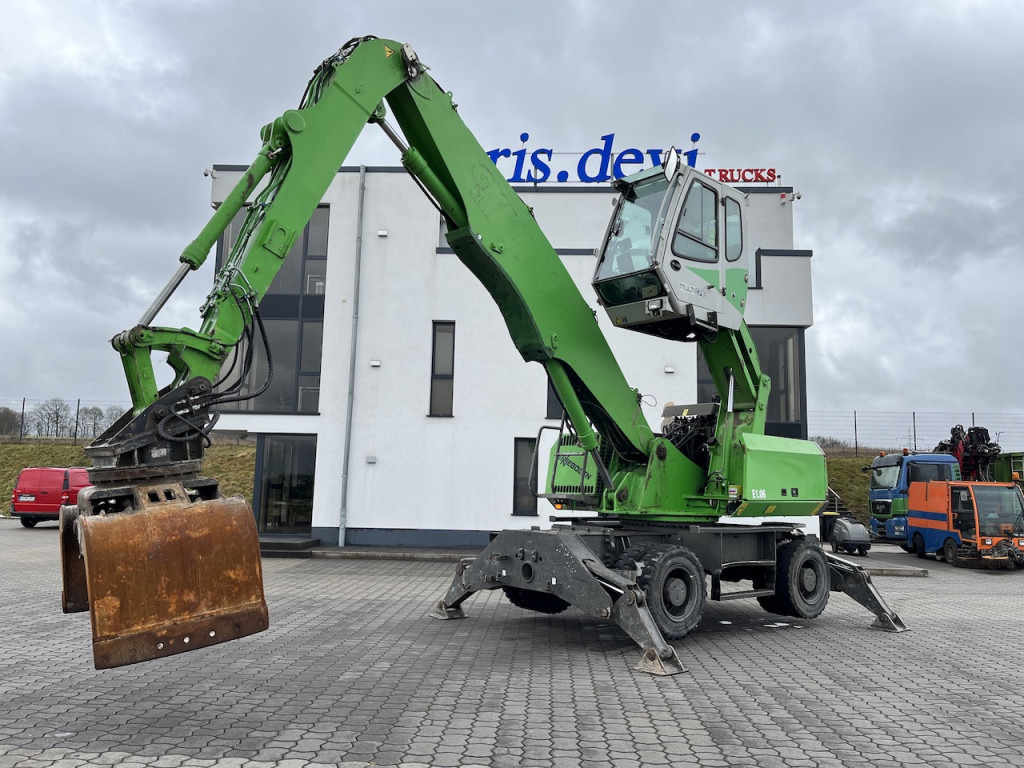Sennebogen 818 Umschlagbagger Greifer - Bager na kotačima: slika Sennebogen 818 Umschlagbagger Greifer - Bager na kotačima Sennebogen 818 Umschlagbagger Greifer - Bager na kotačima: slika Sennebogen 818 Umschlagbagger Greifer - Bager na kotačima