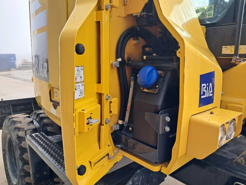 Bager na kotačima Komatsu PW118MR-11: slika Bager na kotačima Komatsu PW118MR-11