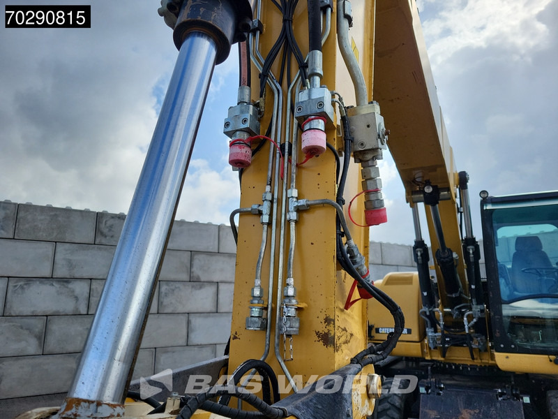 Bager na kotačima Caterpillar M313 D: slika Bager na kotačima Caterpillar M313 D