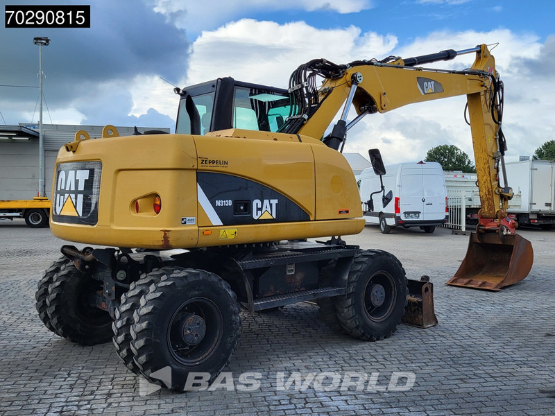 Caterpillar M313 D - Bager na kotačima: slika Caterpillar M313 D - Bager na kotačima Caterpillar M313 D - Bager na kotačima: slika Caterpillar M313 D - Bager na kotačima