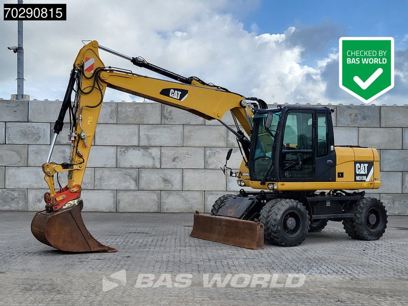Caterpillar M313 D - Bager na kotačima: slika Caterpillar M313 D - Bager na kotačima Caterpillar M313 D - Bager na kotačima: slika Caterpillar M313 D - Bager na kotačima