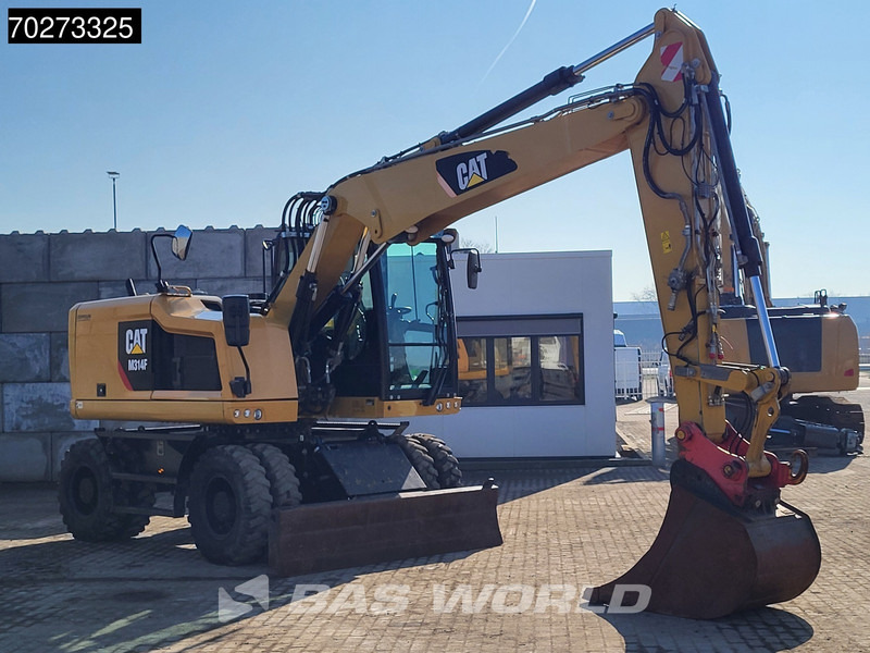 Caterpillar M314 F - Bager na kotačima: slika Caterpillar M314 F - Bager na kotačima Caterpillar M314 F - Bager na kotačima: slika Caterpillar M314 F - Bager na kotačima