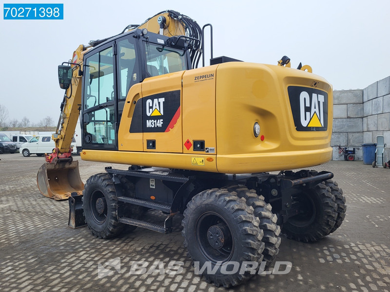 Caterpillar M314 F - Bager na kotačima: slika Caterpillar M314 F - Bager na kotačima Caterpillar M314 F - Bager na kotačima: slika Caterpillar M314 F - Bager na kotačima