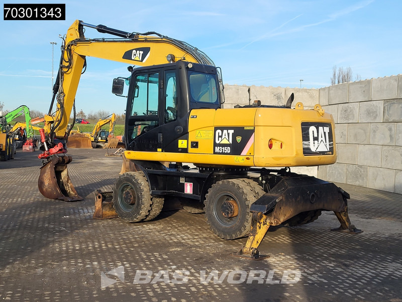 Caterpillar M315 D OUTRIGGERS + BLADE - Bager na kotačima: slika Caterpillar M315 D OUTRIGGERS + BLADE - Bager na kotačima Caterpillar M315 D OUTRIGGERS + BLADE - Bager na kotačima: slika Caterpillar M315 D OUTRIGGERS + BLADE - Bager na kotačima