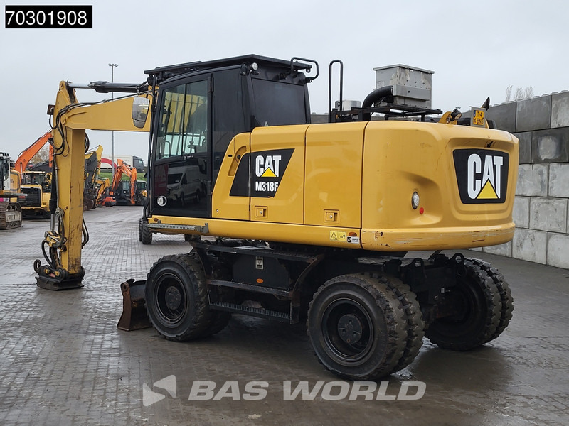 Caterpillar M318 F - Bager na kotačima: slika Caterpillar M318 F - Bager na kotačima Caterpillar M318 F - Bager na kotačima: slika Caterpillar M318 F - Bager na kotačima