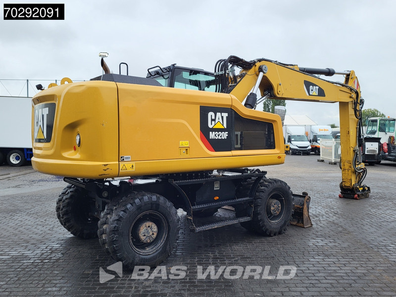 Caterpillar M320 F - Bager na kotačima: slika Caterpillar M320 F - Bager na kotačima Caterpillar M320 F - Bager na kotačima: slika Caterpillar M320 F - Bager na kotačima