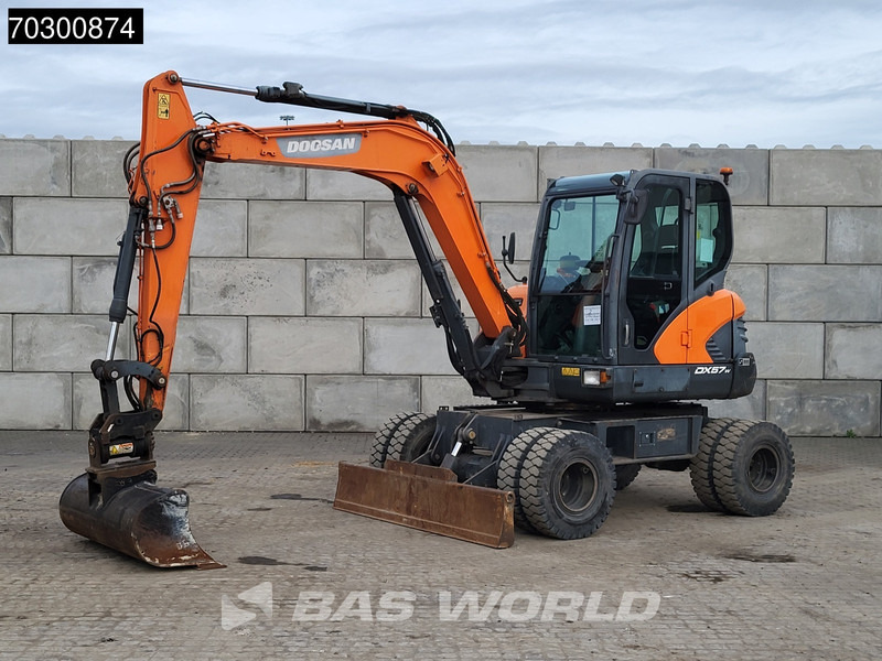 Doosan DX57 W-5 A/C - 3 Buckets - Bager na kotačima: slika Doosan DX57 W-5 A/C - 3 Buckets - Bager na kotačima Doosan DX57 W-5 A/C - 3 Buckets - Bager na kotačima: slika Doosan DX57 W-5 A/C - 3 Buckets - Bager na kotačima