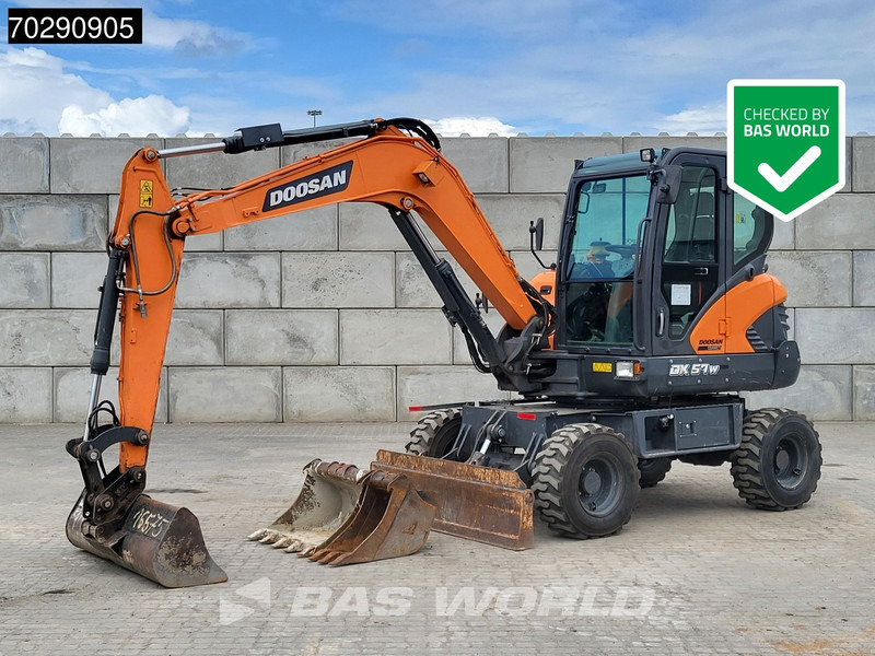 Doosan DX57W-7 - Bager na kotačima: slika Doosan DX57W-7 - Bager na kotačima Doosan DX57W-7 - Bager na kotačima: slika Doosan DX57W-7 - Bager na kotačima