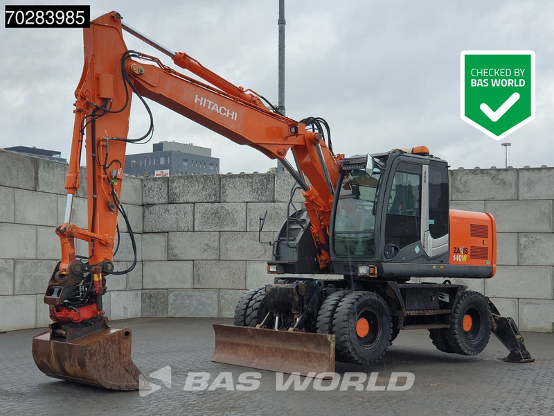 Hitachi ZX140W -3 OUTRIGGERS - ROTOTILT - Bager na kotačima: slika Hitachi ZX140W -3 OUTRIGGERS - ROTOTILT - Bager na kotačima Hitachi ZX140W -3 OUTRIGGERS - ROTOTILT - Bager na kotačima: slika Hitachi ZX140W -3 OUTRIGGERS - ROTOTILT - Bager na kotačima