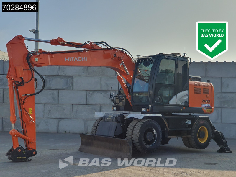 Hitachi ZX140W -6 OUTRIGGERS + BLADE - Bager na kotačima: slika Hitachi ZX140W -6 OUTRIGGERS + BLADE - Bager na kotačima Hitachi ZX140W -6 OUTRIGGERS + BLADE - Bager na kotačima: slika Hitachi ZX140W -6 OUTRIGGERS + BLADE - Bager na kotačima