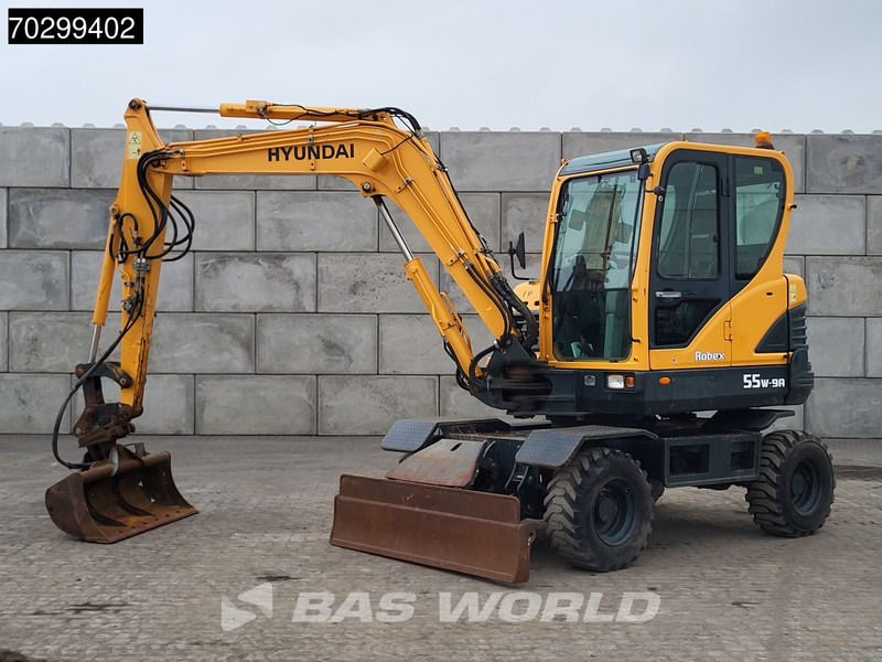 Hyundai Robex 55W-9A EPA - Bager na kotačima: slika Hyundai Robex 55W-9A EPA - Bager na kotačima Hyundai Robex 55W-9A EPA - Bager na kotačima: slika Hyundai Robex 55W-9A EPA - Bager na kotačima