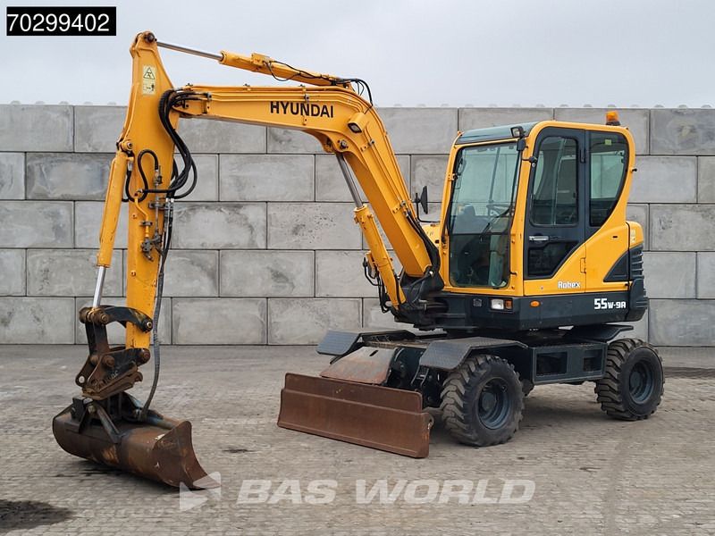 Hyundai Robex 55W-9A EPA - Bager na kotačima: slika Hyundai Robex 55W-9A EPA - Bager na kotačima Hyundai Robex 55W-9A EPA - Bager na kotačima: slika Hyundai Robex 55W-9A EPA - Bager na kotačima