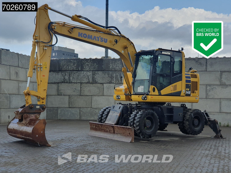 Komatsu PW148 -11 - Bager na kotačima: slika Komatsu PW148 -11 - Bager na kotačima Komatsu PW148 -11 - Bager na kotačima: slika Komatsu PW148 -11 - Bager na kotačima