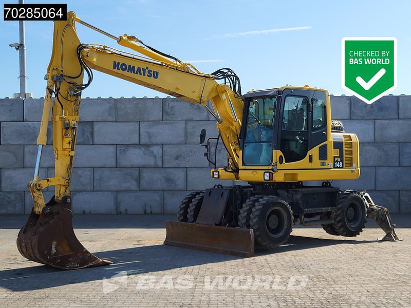 Komatsu PW148 -8 - Bager na kotačima: slika Komatsu PW148 -8 - Bager na kotačima Komatsu PW148 -8 - Bager na kotačima: slika Komatsu PW148 -8 - Bager na kotačima