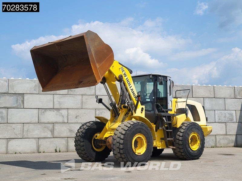 New Holland W270 - Utovarivač na kotačima: slika New Holland W270 - Utovarivač na kotačima New Holland W270 - Utovarivač na kotačima: slika New Holland W270 - Utovarivač na kotačima