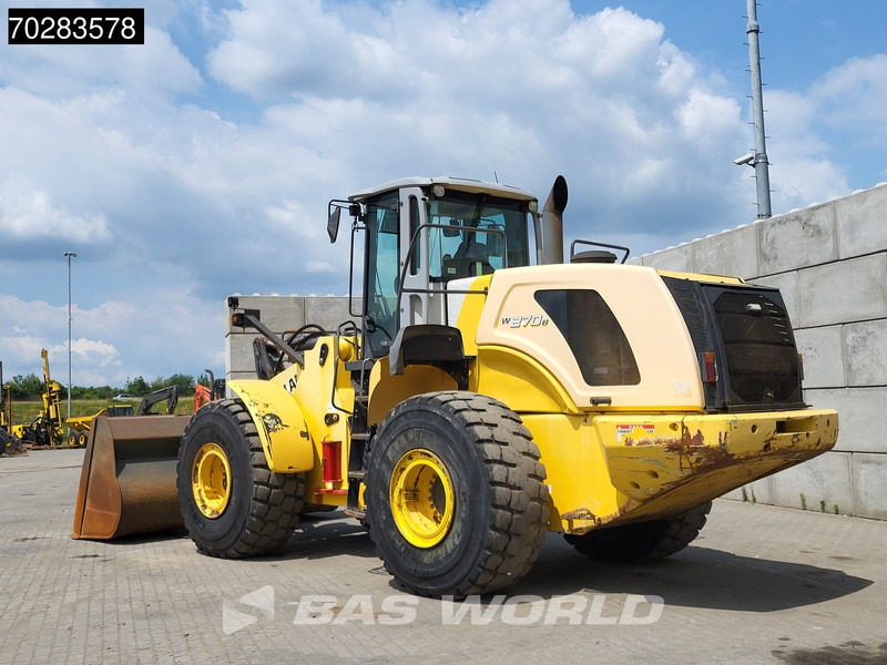 New Holland W270 - Utovarivač na kotačima: slika New Holland W270 - Utovarivač na kotačima New Holland W270 - Utovarivač na kotačima: slika New Holland W270 - Utovarivač na kotačima