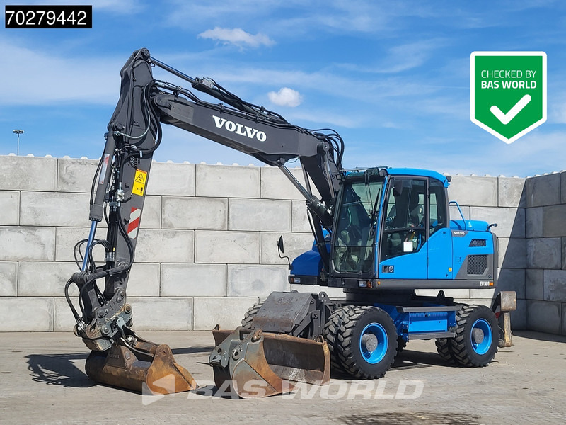 Volvo EW140 D GERMAN MACHINE - Bager na kotačima: slika Volvo EW140 D GERMAN MACHINE - Bager na kotačima Volvo EW140 D GERMAN MACHINE - Bager na kotačima: slika Volvo EW140 D GERMAN MACHINE - Bager na kotačima