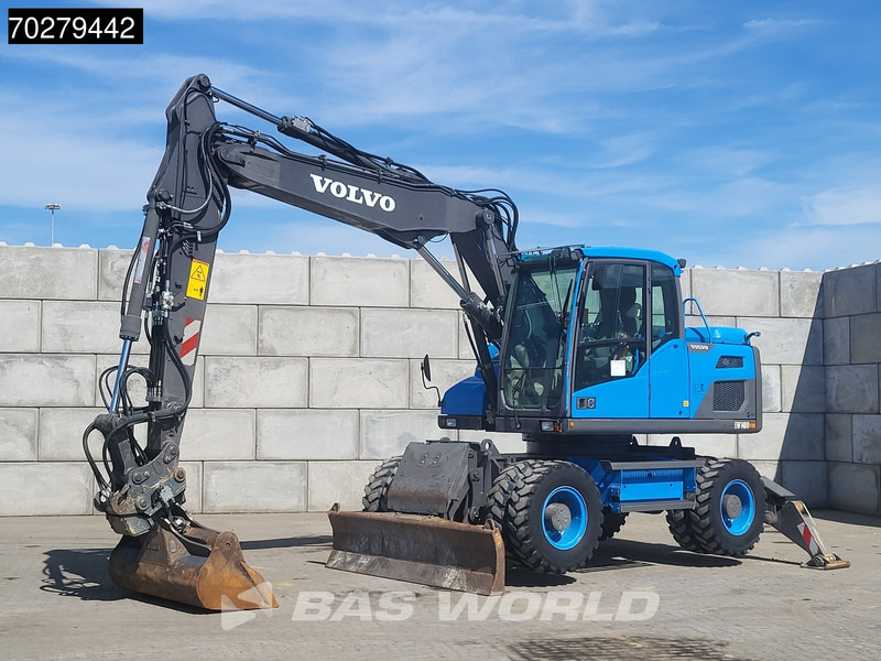 Volvo EW140 D GERMAN MACHINE - Bager na kotačima: slika Volvo EW140 D GERMAN MACHINE - Bager na kotačima Volvo EW140 D GERMAN MACHINE - Bager na kotačima: slika Volvo EW140 D GERMAN MACHINE - Bager na kotačima